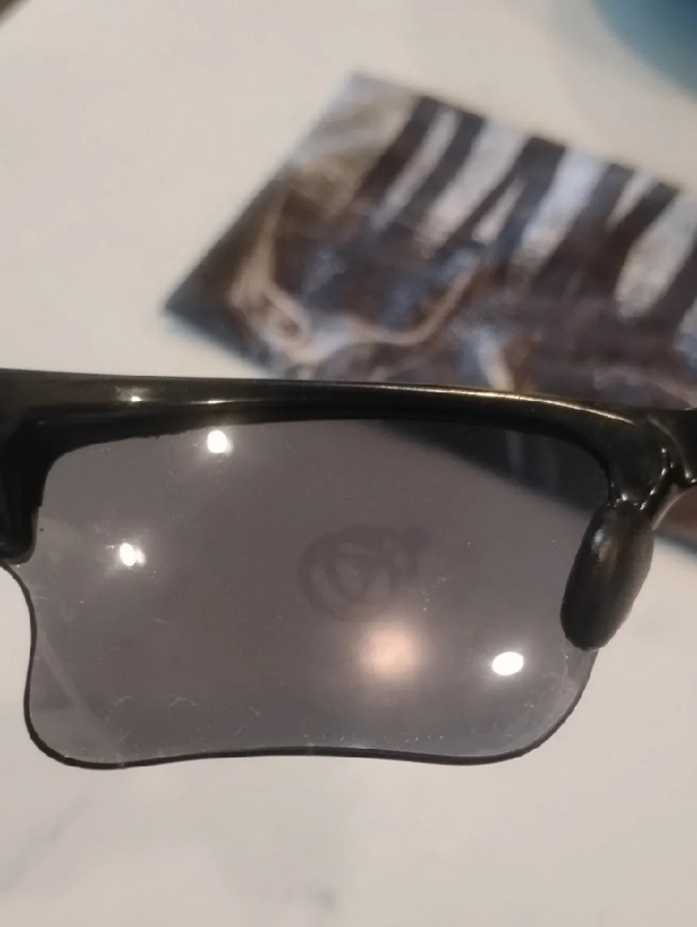 Oakley Black Frame Sunglasses with Gray And Orange Lenses